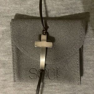New brushed sterling silver cross and dark brown leather adjustable bracelet.